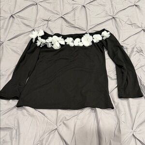 Black Off-Shoulder Top with White Floral Accents